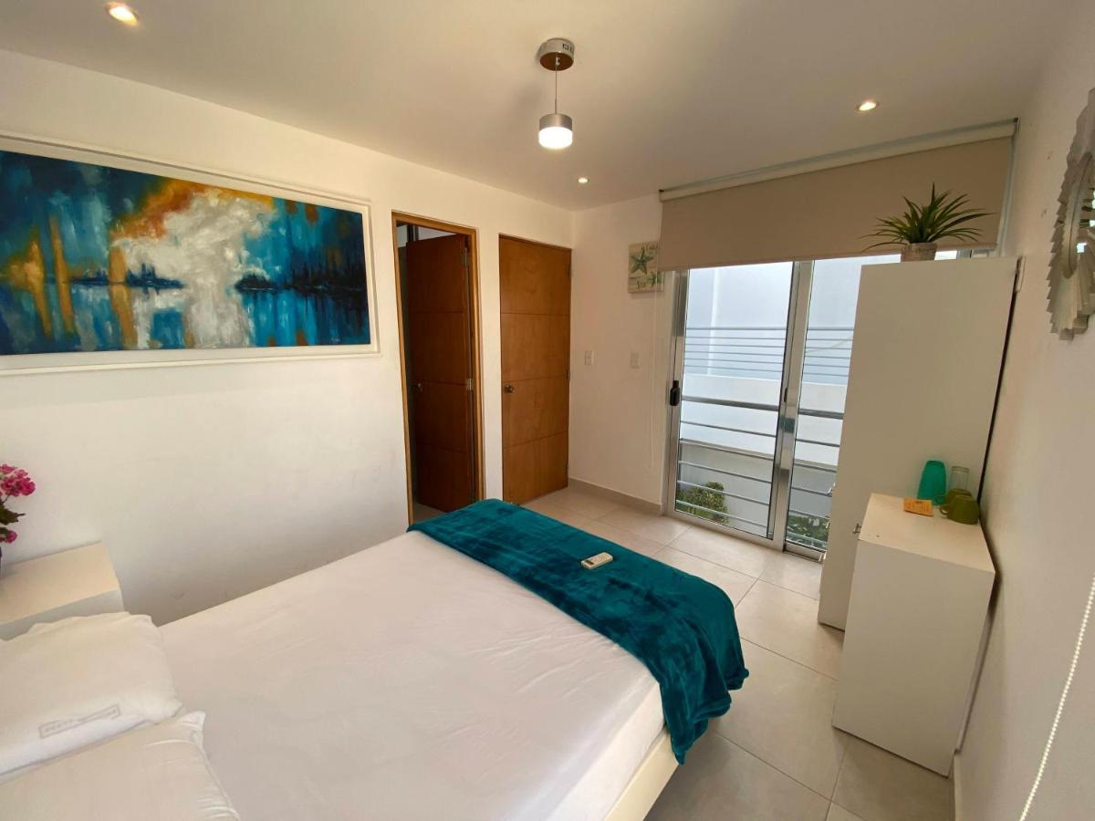 إيسلا موخيريس Arrecife Apartments المظهر الخارجي الصورة
